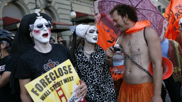Protestors with Occupy San Francisco take part in a demonstration on the streets of San Francisco