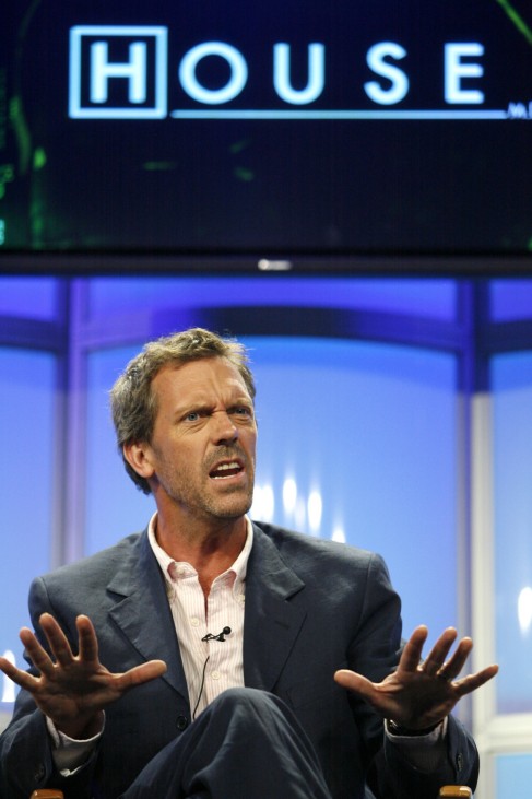 Cast member Hugh Laurie gestures during the panel for the FOX television series 'House M.D.' at the Television Critics Association Summer Press Tour in Beverly Hills