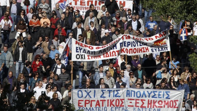 People take part in an anti-austerity rally in Athens' Syntagma square