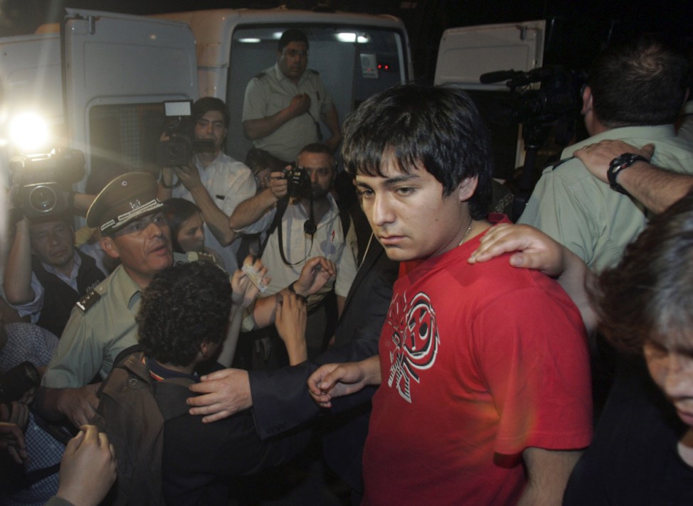 Students are arrested after occupying the Senate headquarters in Santiago