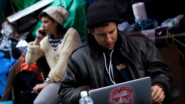 Occupy-Wall-Street beschuldigt Unternehmen: Die Netzgemeinde schwenkt bei den Protesten gerade von Twitter auf Vibe um.