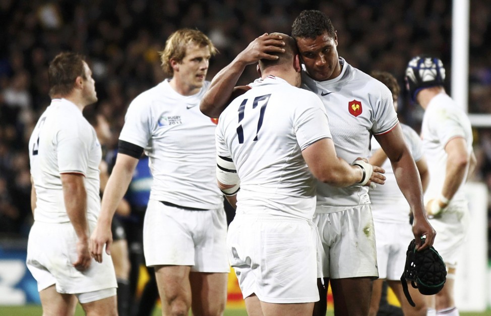 France players react after losing the Rugby World Cup final against New Zealand All Blacks at Eden Park in Auckland
