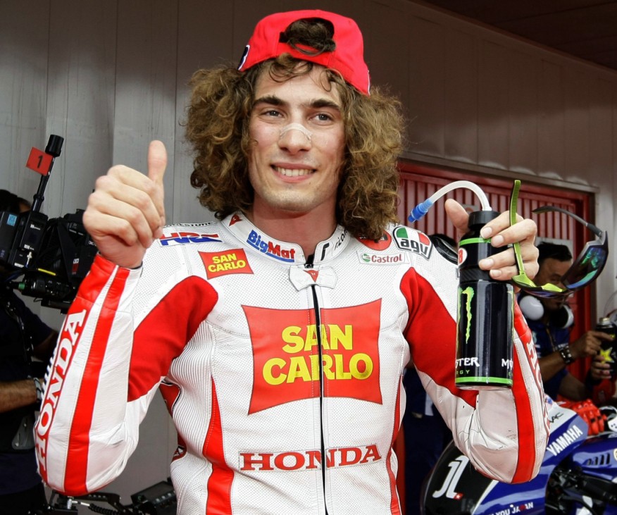 File photo of Honda MotoGP rider Marco Simoncelli of Italy after taking pole position for the Catalunya MotoGP Grand Prix