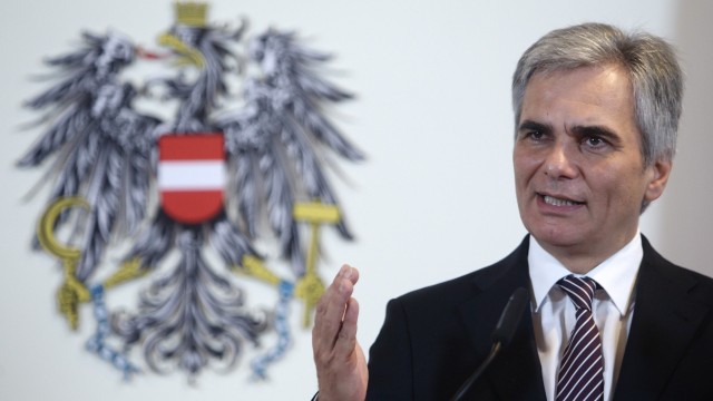 Austrian Chancellor Faymann addresses a news conference after a cabinet meeting in Vienna