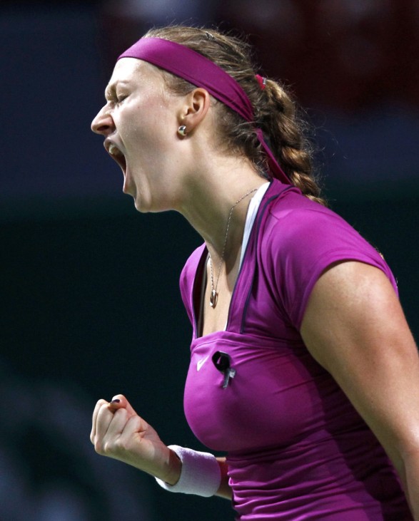 Kvitova of the Czech Republic reacts during her semifinal WTA tennis championships match against Stosur of Australia in Istanbul