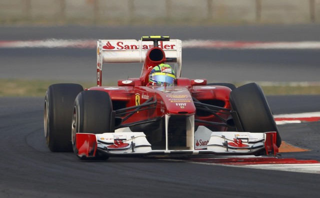 Ferrari Formula One driver Massa drives with a broken front left suspension during the Indian first Formula One Grand Prix in Greater Noida