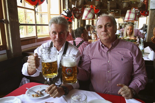 FC Bayern Munich's coach Heynckes and president Hoeness pose during a visit at Oktoberfest in Munich
