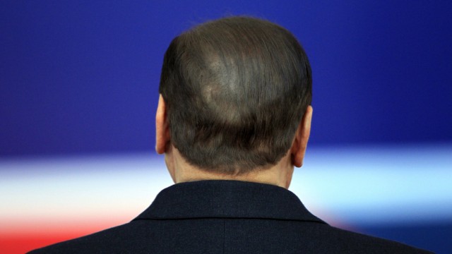 File photo shows Italy's PM Berlusconi arriving for the second day of the G20 Summit in Cannes
