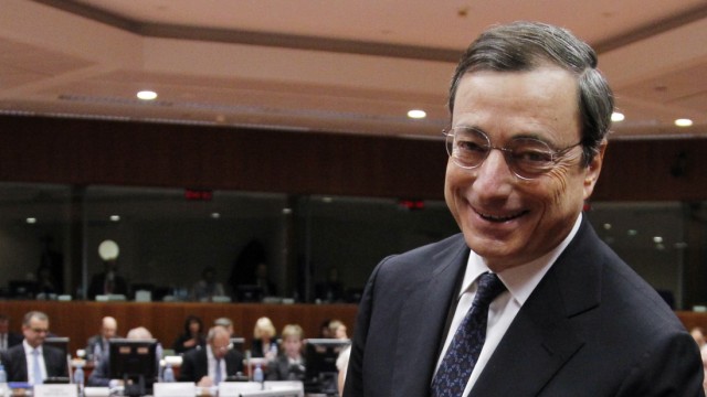 ECB President Mario Draghi arrives at an EU finance ministers meeting in Brussels