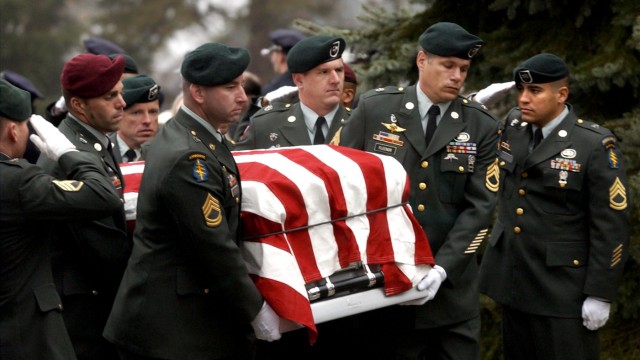 BODY OF US SOLDIER CARRIED INTO CHURCH
