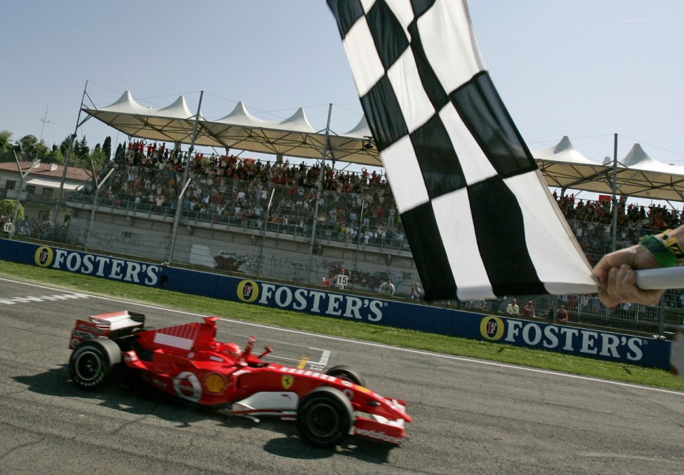 Ferrari Formula One driver Schumacher of Germany crosses finish line on his way to win San Marino Grand Prix in Italian town of Imola