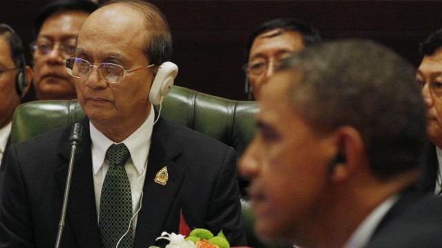 Myanmar President Thein Sein listens as U.S. President Barack Obama speaks at meeting in Indonesia