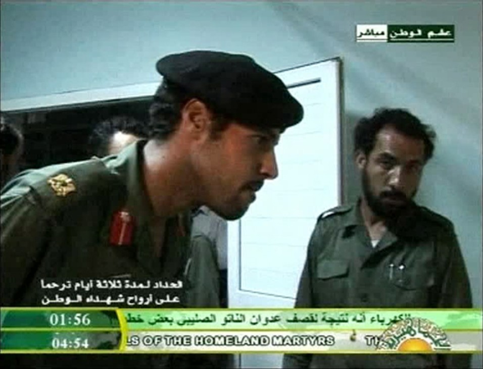 Still image from video footage by Libyan state television shows what it says is Muammar Gaddafi's son Khamis visiting wounded Libyans in a hospital