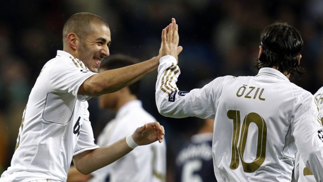 Real Madrid's Benzema celebrates his goal against Dinamo Zagreb with Ozil during their Champions League soccer match in Madrid