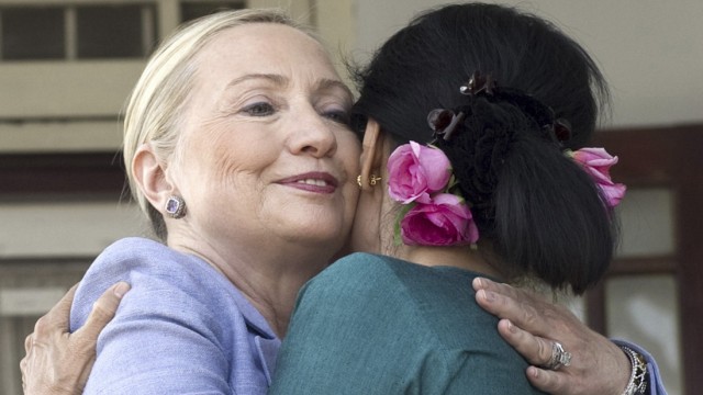 Pro-democracy leader Suu Kyi and U.S. Secretary of State Clinton embrace after meeting in Yangon