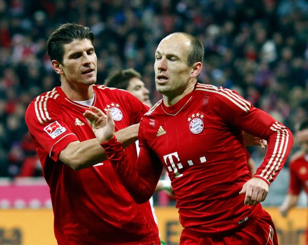Munich's Robben and Gomez celebrate a goal against Werder Bremen during their German Bundesliga first division soccer match in Munich