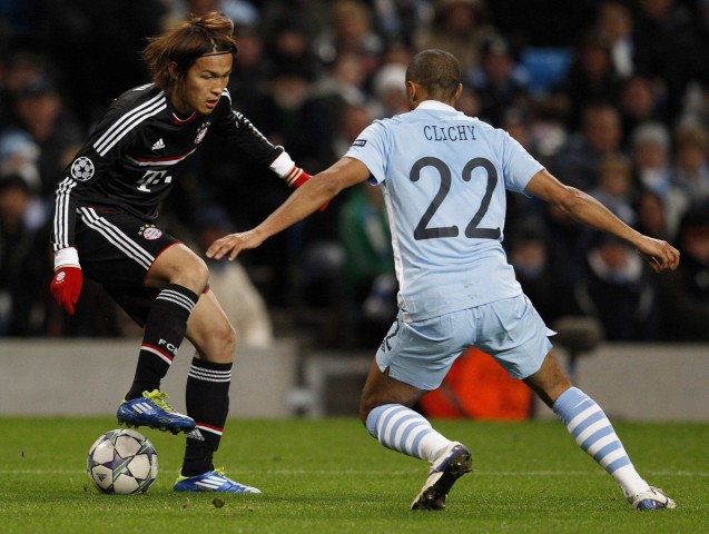 Manchester City's Clichy challenges Bayern Munich's Usami during their Champions League Group A soccer match at The Etihad Stadium in Manchester
