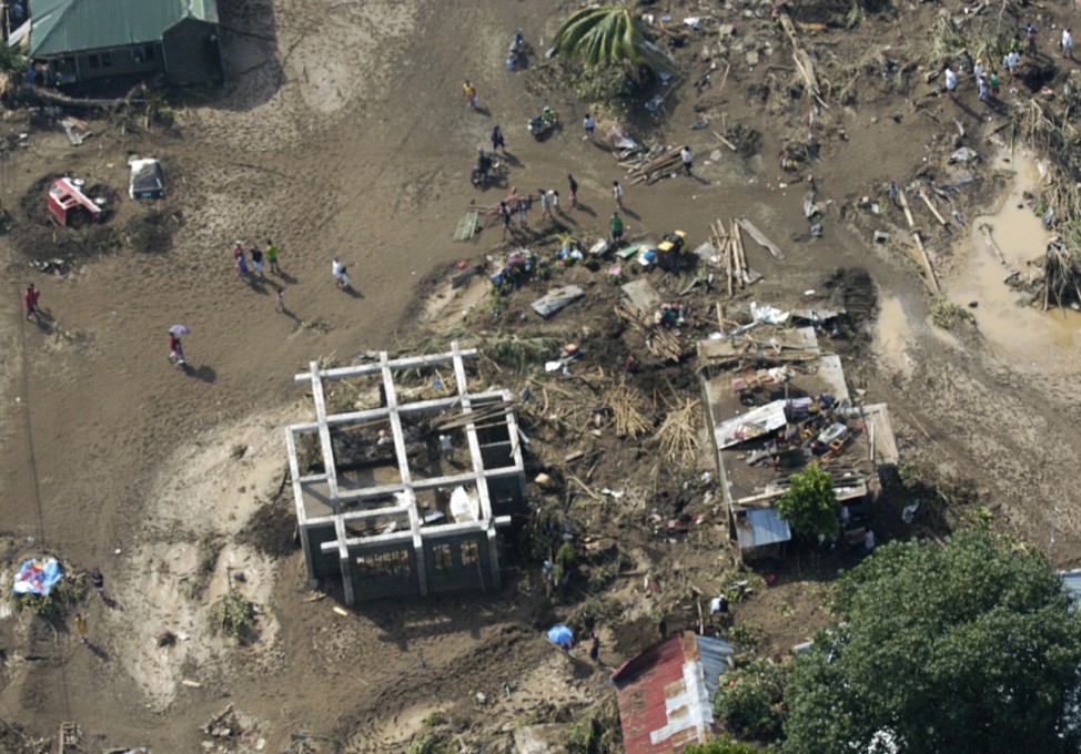 Aerial view shows shanties damaged by flash floods brought by Typhoon Washi in Cagayan De Oro city