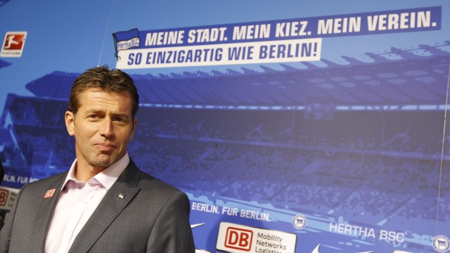 New Hertha Berlin coach Skibbe arrives for news conference in Berlin