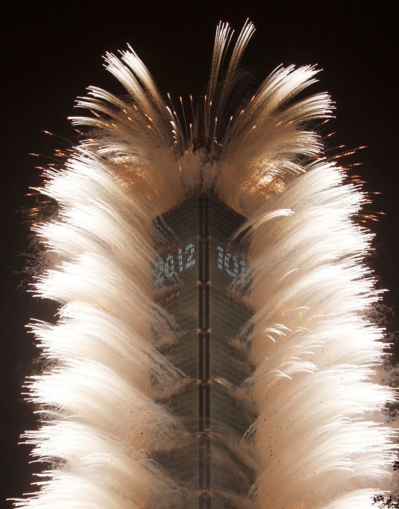 Fireworks explode from Taiwan's tallest skyscraper Taipei 101 during New Year celebrations in Taipei