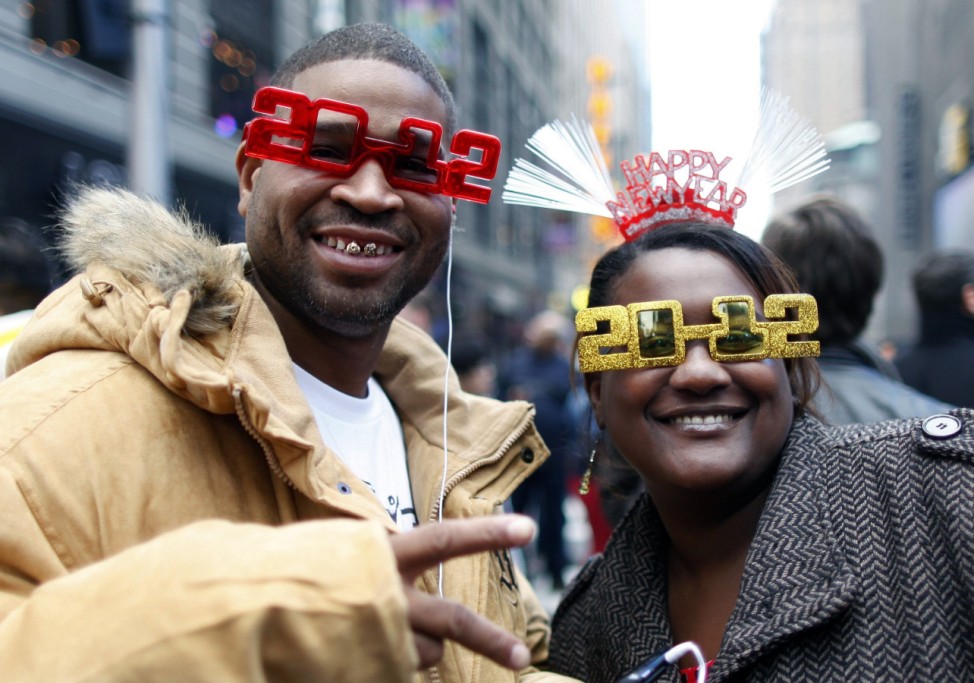 Coi Taylor from Indianapolis poses with his wife Yvonne as Times Square begins to fill up with an expected 1 million people to celebrate the start of the new year in New York