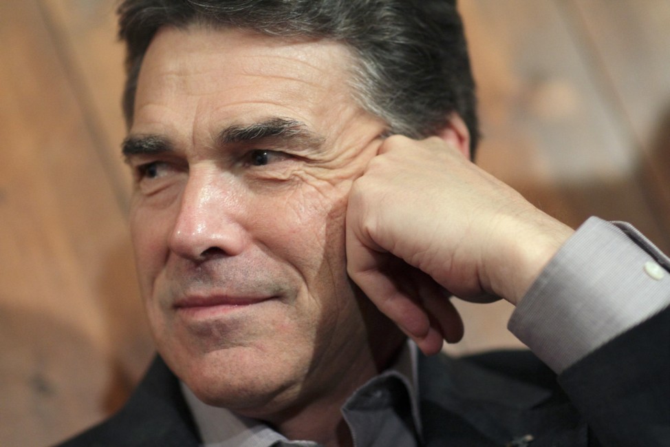 Republican presidential candidate Rick Perry campaigns at the Fainting Goat restaurant in Waverly, Iowa