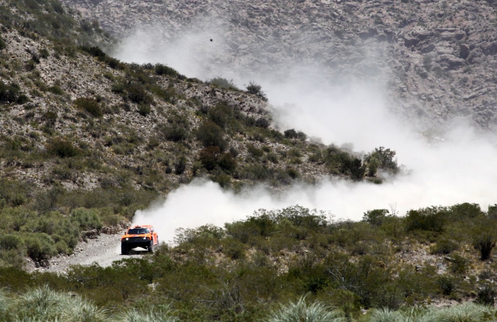 Gordon of the U.S and co-pilot Campbell drive their Hummer during the third stage of the fourth South American edition of the Dakar Rally 2012 from San Rafael to San Juan