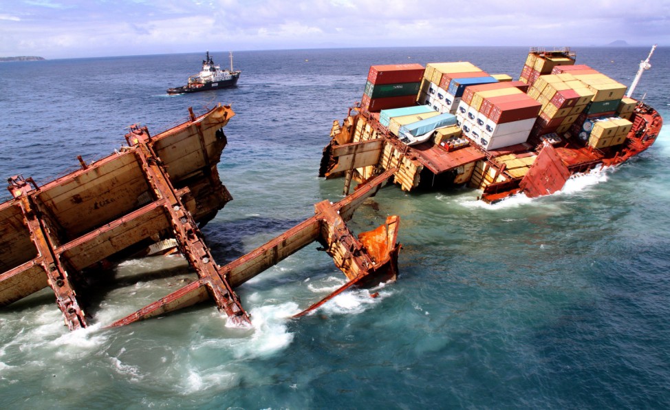 Rena slips off reef after its hull split into two