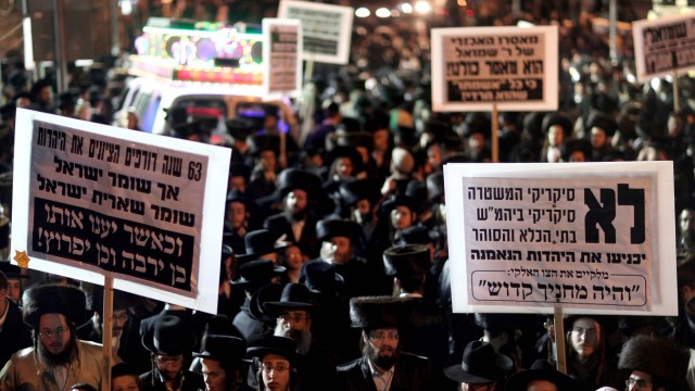 Ultra Orthodox Jews dressed as Holocaust prisoners during protest