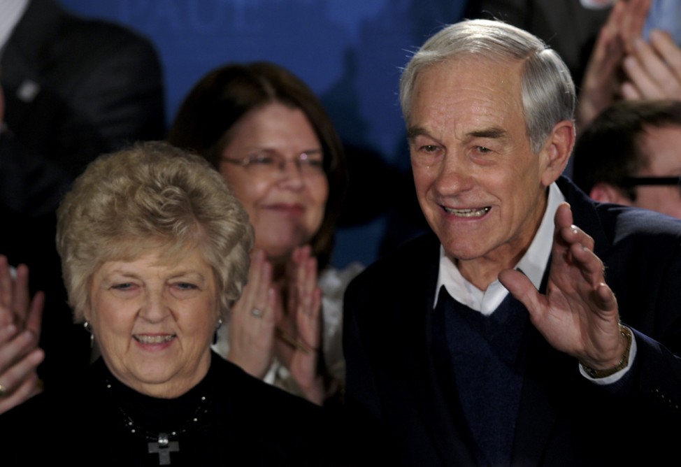 Republican presidential candidate U.S. Congressman Ron Paul and his wife Carol acknowledge supporters at his New Hampshire primary night rally in Manchester