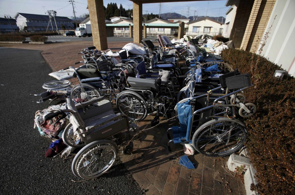 Abandoned wheelchairs are seen outside Okuma Town Health Center in Okuma town inside the Fukushima exclusion zone