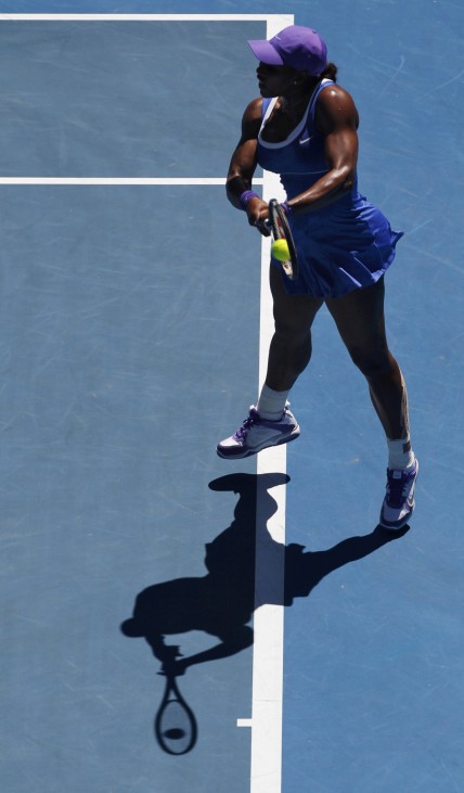 Williams of the U.S. hits a return to Makarova of Russia during their match at the Australian Open tennis tournament in Melbourne