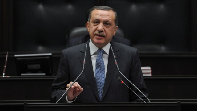 Turkey's Prime Minister Recep Tayyip Erdogan addresses lawmakers