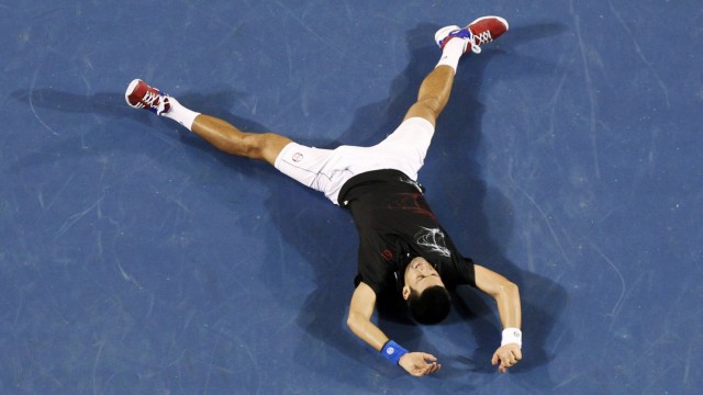 Djokovic of Serbia celebrates after defeating Nadal of Spain in their men's singles final match at the Australian Open tennis tournament in Melbourne