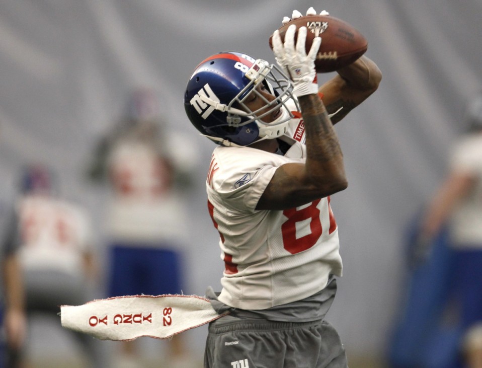 Giants wide receiver Manningham makes a catch during practice for the NFL Super Bowl XLVI in Indianapolis