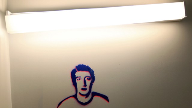 File photo of a sketch of founder and CEO Mark Zuckerberg is seen on a wall at the new headquarters of Facebook in Menlo Park