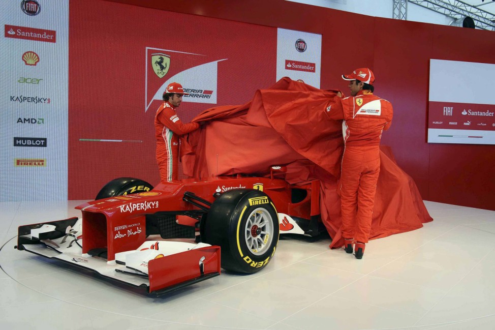 Formula One drivers Alonso and Massa unveil the new Ferrari Formula1 F2012 car