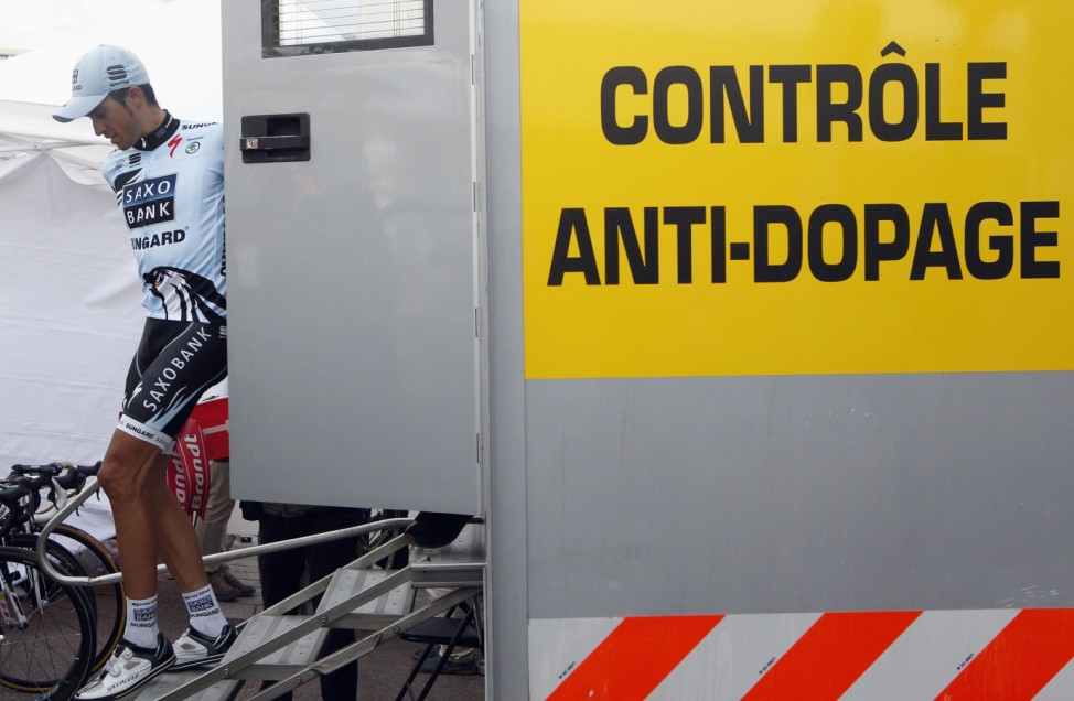 File photo shows Saxo Bank-Sungard rider Contador of Spain entering the anti-doping medical testing facility after the19th stage of the Tour de France 2011 cycling race from Modane to Alpe d' Huez