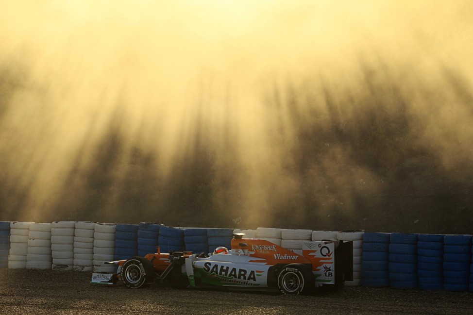 Force India Formula One driver Jules Bianchi of France sits in his VJM05 after driving his car out of the track in Jerez