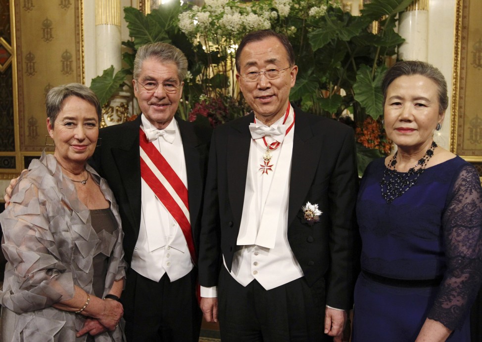 Fischer, Austrian President Fischer, U.N. Secretary General Ban and his wife Yoo pose as they arrive at the traditional Opera Ball in Vienna