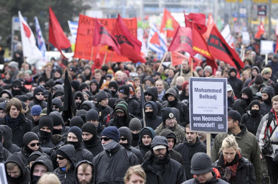 Left-wing demonstrators take part in a march against neo-Nazis in Dresden
