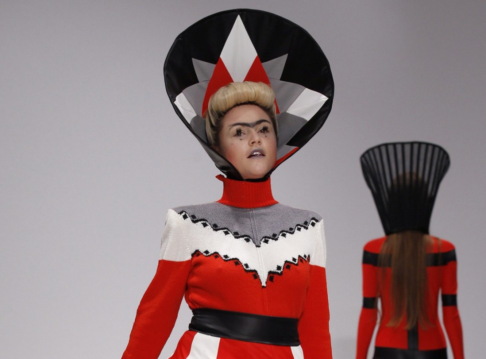 Actress Winstone presents a creation at the Pam Hogg 2012 Autumn/Winter collection show during London Fashion Week