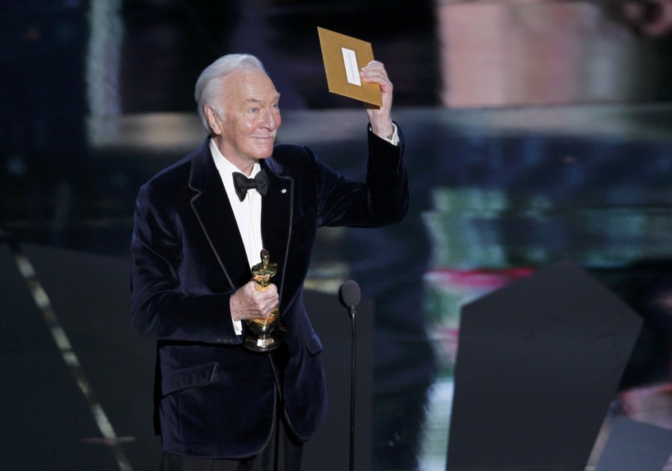 Plummer, accepts the Oscar for best supporting actor  for his role in 'Beginners' at the 84th Academy Awards in Hollywood
