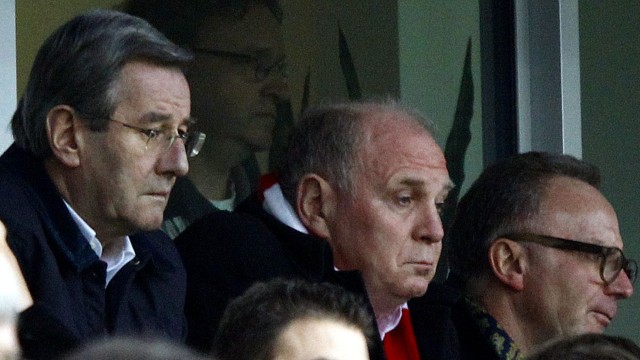 CFO Karl Hopfner President Uli Hoeness and CEO Karl-Heinz Rummenigge of Bayern Munich react during Bundesliga match against Bayer 04 Leverkusen in Leverkusen