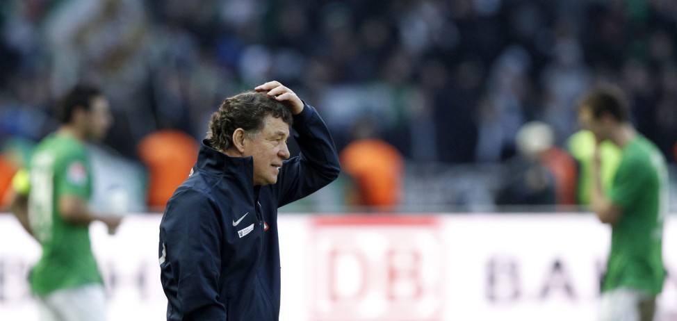 Hertha Berlin's head coach Rehhagel reacts after German first division Bundesliga soccer match against Werder Bremen in Berlin