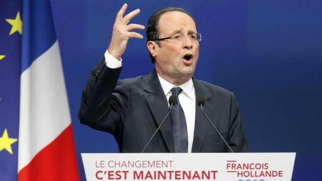 Hollande, Socialist Party candidate for the 2012 French presidential election, delivers a speech during a campaign rally in Dijon