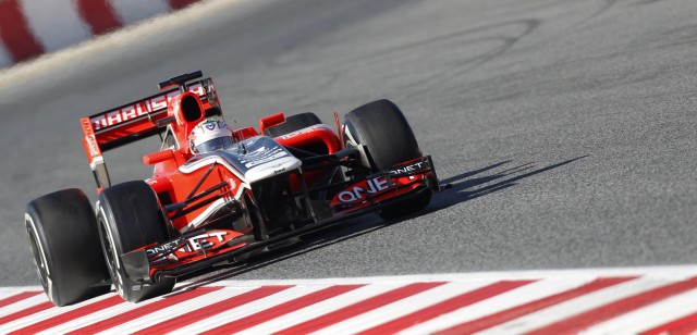 Marussia F1 driver Charles Pic of France races during a training session at Circuit de Catalunya racetrack