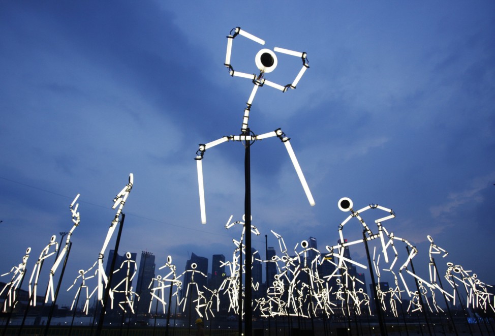 Art installation 'Key Frames' by Groupe LAPS of France lights up during a media preview of the i Light Marina Bay sustainable light art festival in Singapore