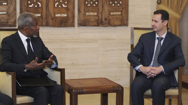 Syria's President Bashar al-Assad meets U.N.-Arab League envoy Kofi Annan, in Damascus