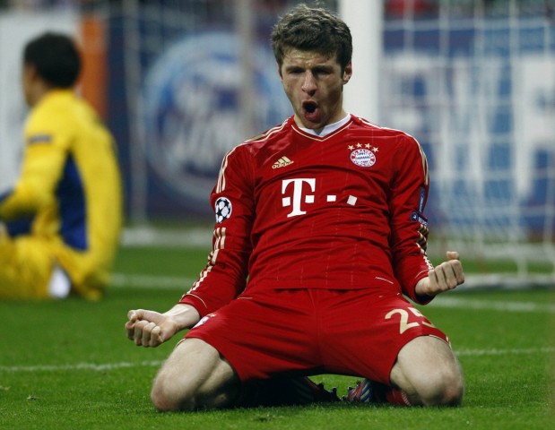 Mueller of Bayern Munich celebrates a goal against FC Basel during their Champions League round-of-16 second leg match in Munich